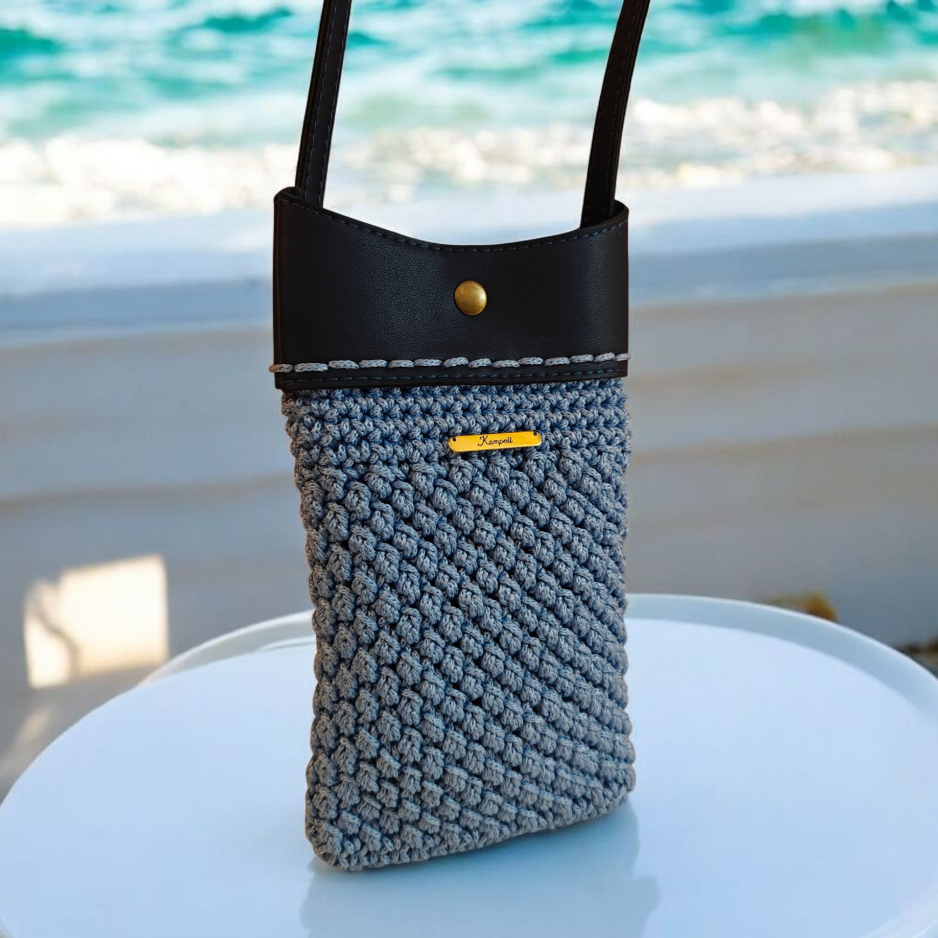 Πλεκτό τσαντάκι κινητού σιέλ-μπλε